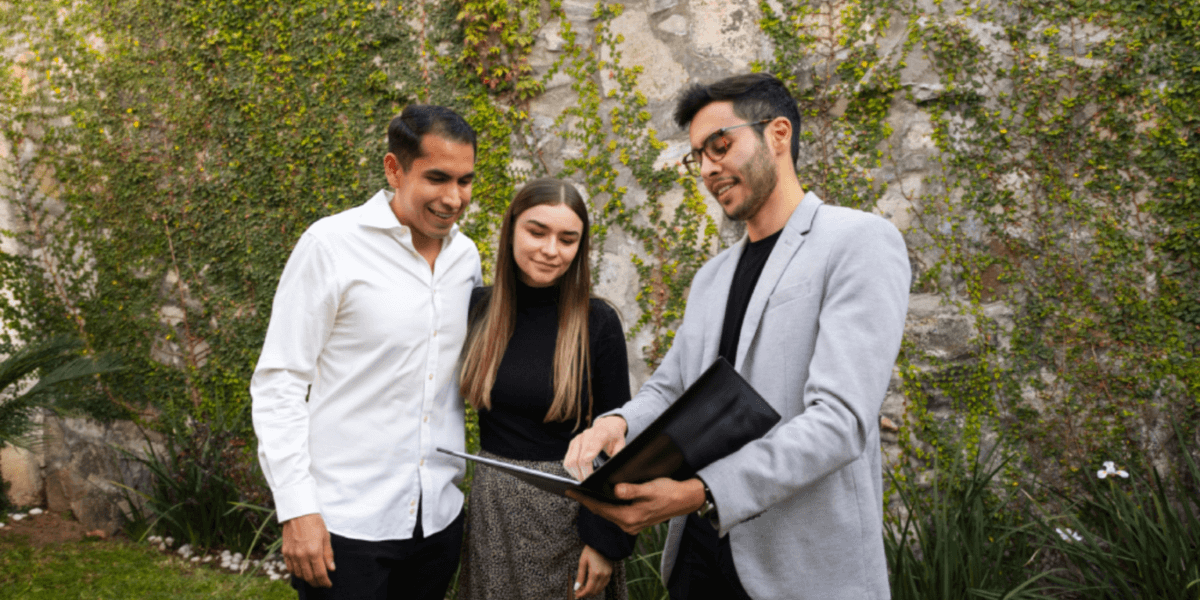 A couple speaks with an eminent domain lawyer about their case.